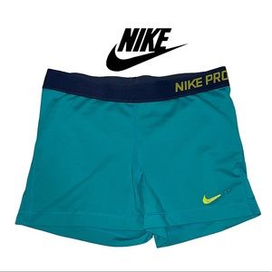 nike pros teal